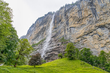 The Staubbach waterfall in Lauterbrunnen, in Bernese Oberland, Switzerland. The Staubbach waterfall with its drop of almost 300 meters is the third highest waterfall in Switzerland.