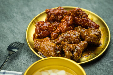 Fried chicken wings with sweet sauce and spicy sauce. Korean style.