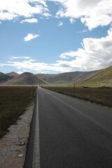 Italy, Umbria: The road that leads to Castelluccio.