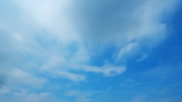 4K UHD : Beautiful blue sky with clouds background. majestic blue sky landscape. nature concept. tropical sky
