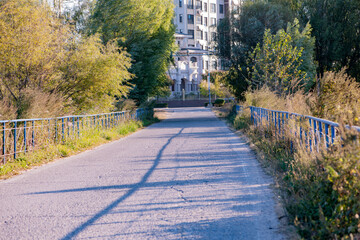 The asphalt pavement on the small bridge in the city