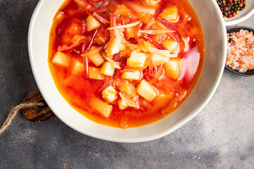 borsch red vegetable soup beetroot, cabbage, tomato, onion healthy meal food snack on the table copy space food background 