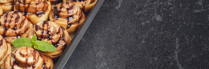 cinnabons cinnamon bun with chocolate banner