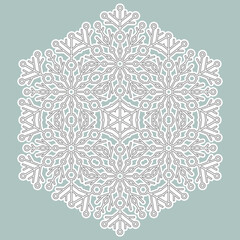 Round vector snowflake. Abstract winter ornament. Pattern with light blue and white snowflake