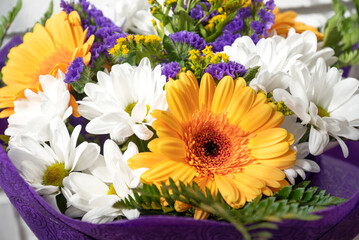 Bunch of fresh flowers with gerbera and chrysanthemums