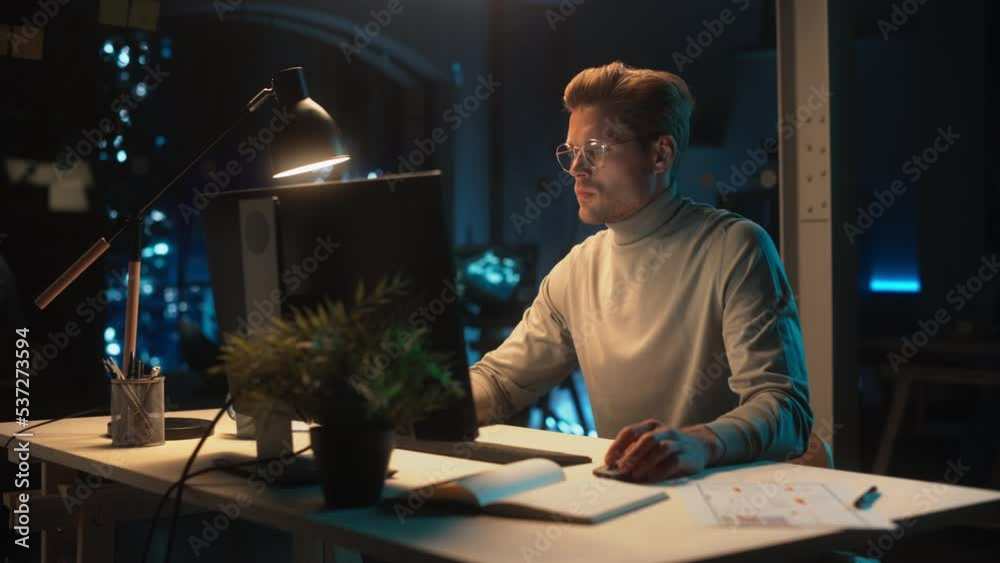 Poster office at night: manager working long hours alone in creative agency, implementing business strategy