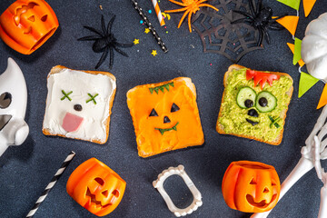 Kids food, party or breakfast Halloween idea. Simple healthy sandwiches recipe from toast bread,...