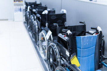 Naklejka na ściany i meble A row of wheelchairs in the hospital, wheelchairs waiting for patient service