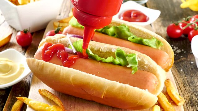 hot dog with mustard and ketchup