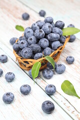 Blueberries on a wooden background