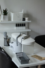 Manicurist's workplace. Manicurist. Manir table. beauty master tools.nail lamp.beauty salon.beauty salon interior.manicure machine