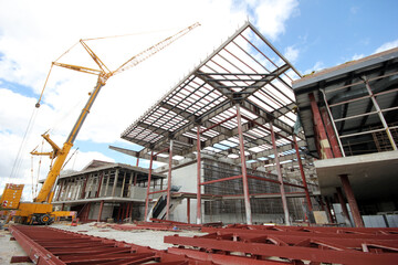 Naklejka premium Steel frame of a new factory building under construction