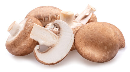 Brown cap champignons with slices of champignon mushroom isolated on white background. Close-up.