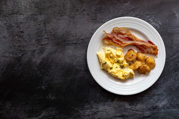 Plate of Scrambled Eggs and Bacon