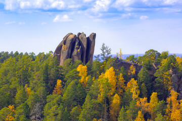 Colorful autumn mountain landscape with Perjya pillars in Stolby Nature Reserve in Krasnoyarsk,...