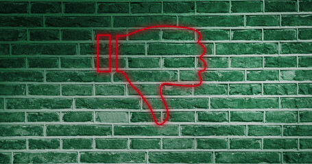 Composite of illuminated red dislike button icon over brick wall, copy space