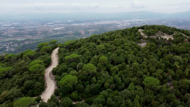 Aerial view from the mountain and city reveal 4K fotage
