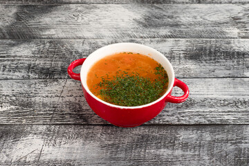 Soup, homemade soup on a wooden white background