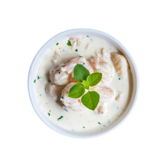 Shrimp with white sauce in a bowl top view