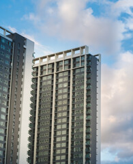 Modern condominium , apartment building with blue sky background.