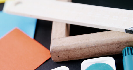 Close-up of wooden stationeries on table, copy space
