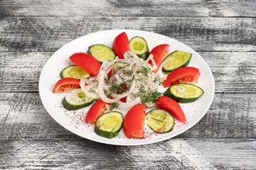 Salad, salad with vegetables on a wooden white background