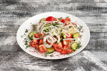Salad, salad with vegetables on a wooden white background