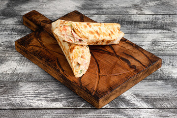 Shawarma, shawarma with chicken on a wooden white background