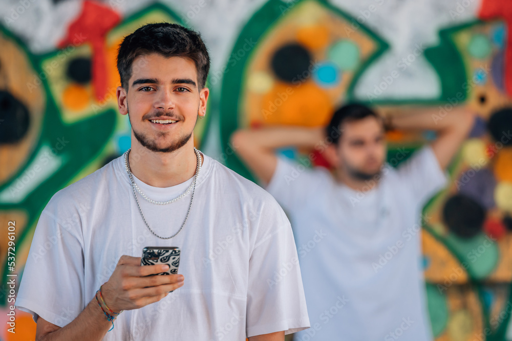 Poster group of young people in the street with mobile phone