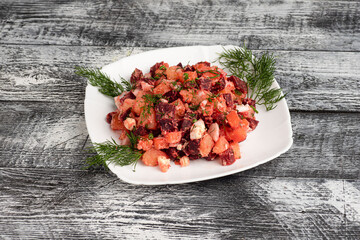 Lettuce, beetroot salad on a wooden white background
