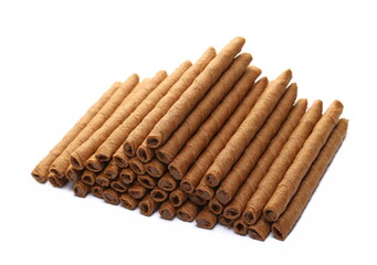 Waffle chocolate sticks with of cream black chocolate and orange, isolated on white