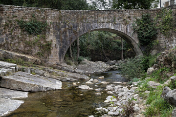 Fototapeta na wymiar Stone Bridge of Barcena Mayor, Cantabria, Spain