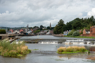 Fototapeta na wymiar Trews Weir the Exeter ship canal Devon England one of the oldest artificial waterways in the uk