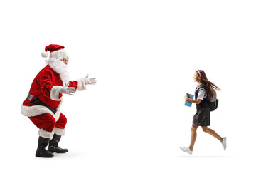 Schoolgirl running to hug santa claus