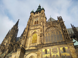 Fototapeta premium St. Vitus Cathedral. Beautiful view of the gothic cathedral, low angle view.