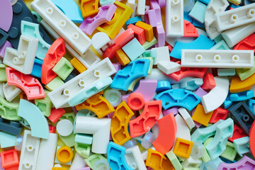 Fototapeta premium colorful building blocks on wooden table , top view 