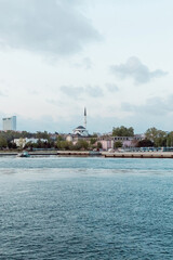Fototapeta na wymiar famous suleymaniye mosque near buildings and bosporus in istanbul.