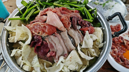 Thai barbecue grill pork on hot pan, Moo-gata pork pan, Thai traditional BBQ style.