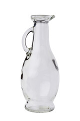 An empty glass, transparent jug with a handle and a narrow neck. Isolated on a white background.