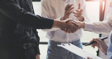 Business handshake for teamwork of business merger and acquisition,successful negotiate,hand...