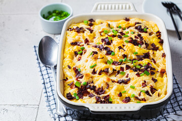 Baked mashed potatoes with bacon and green onion. Festive Christmas or Thanksgiving Day dish.