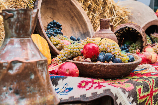 Still life of fresh fruits and nuts, selective focus, harvest season. Ecological products.