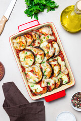Baked eggplant with cheese mozzarella and tomatoes. Healthy eating. Italian food. Parmigiana di melanzane.