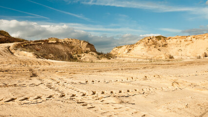 sand quarry, in the photo, a quarry for the extraction of sand against a blue sky