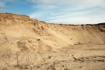 sand quarry, in the photo, a quarry for the extraction of sand against a blue sky