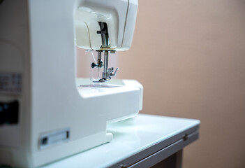Close-up of a sewing machine on a table