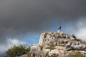 Hiker on the summit of a mountain