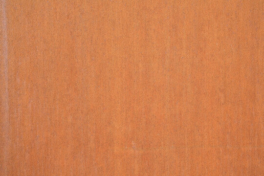Rusty metal plate front view used in construction industry - Corten steel background