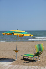 umbrella and deck chairs by the sea in the exclusive Resort in summer
