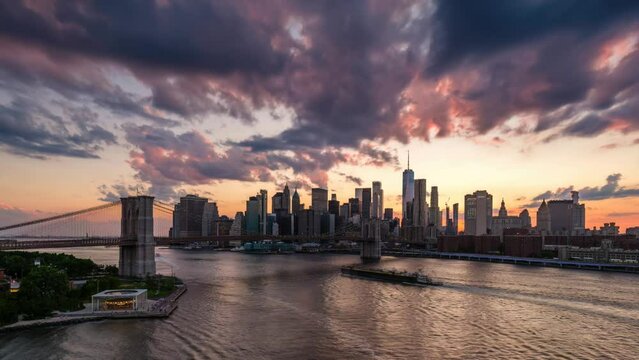 Day to Night Timelapse Sunset Clouds Moving Over Lower Manhattan Skyline view from Manhattan Bridge